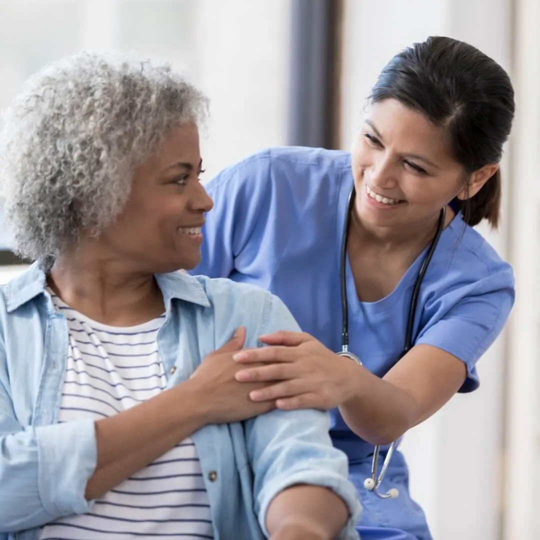 Nurse with elderly patient